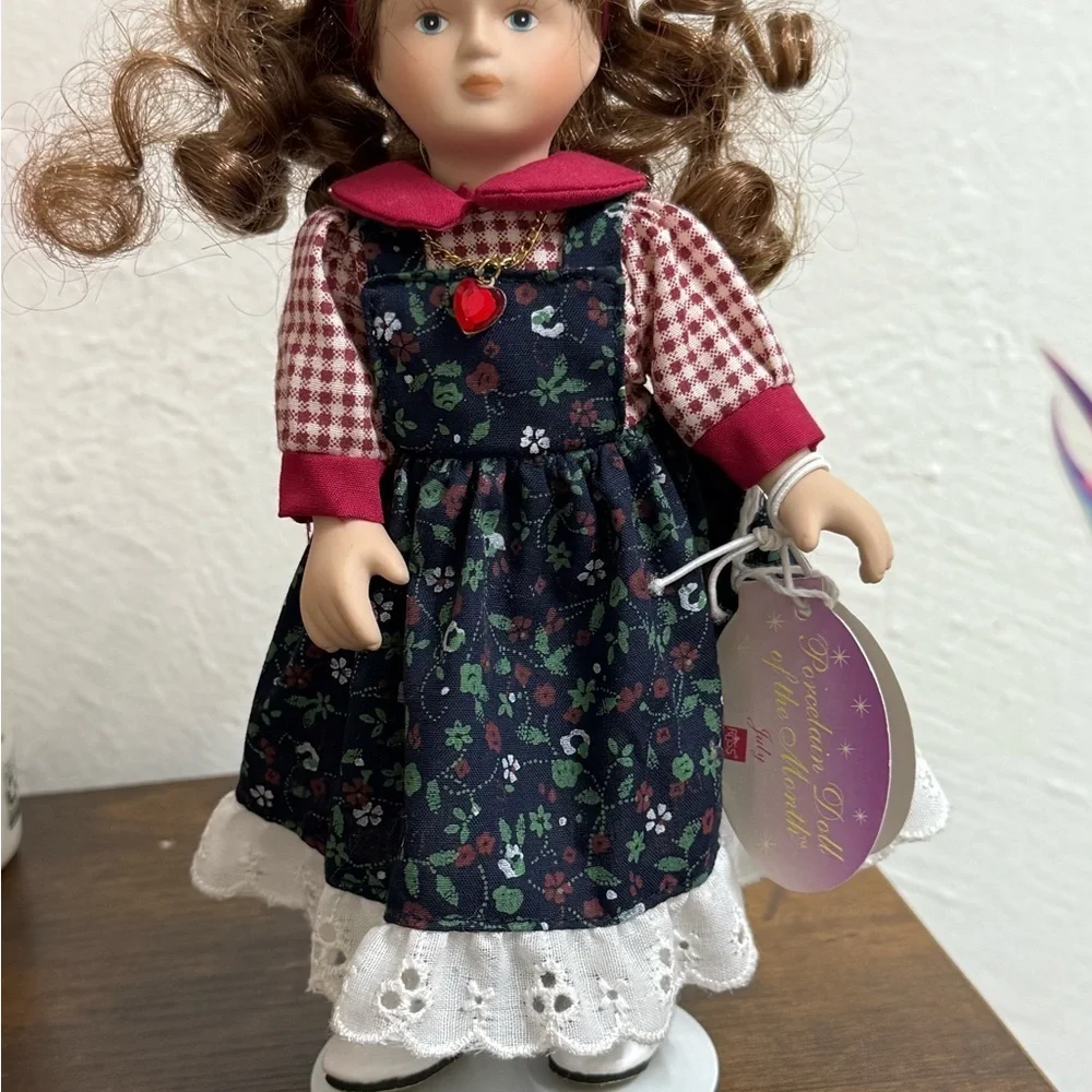 Russ Doll with Navy Floral Dress and Red Accents